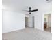 Large bedroom with neutral carpet leads to the walk-in closet and spacious bathroom with updated vanities at 1037 Water Cove St, Henderson, NV 89011