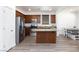 Eat-in kitchen with stainless appliances, a central island, and plenty of storage at 1037 Water Cove St, Henderson, NV 89011