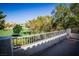View from a balcony overlooking a well-maintained golf course, trees and other landscaping providing a tranquil ambiance at 105 Chateau Whistler Ct, Las Vegas, NV 89148