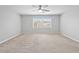 Bedroom with carpet, neutral walls, window, and ceiling fan at 1063 Silver Star St, Henderson, NV 89002