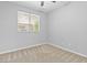 Cozy bedroom featuring carpet flooring, neutral paint, and ample natural light at 1063 Silver Star St, Henderson, NV 89002