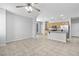 Bright open-concept kitchen features stainless appliances and tile flooring at 1063 Silver Star St, Henderson, NV 89002