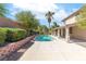 Refreshing pool area with well-maintained patio and landscaping, perfect for outdoor enjoyment at 1063 Silver Star St, Henderson, NV 89002