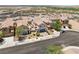 Aerial view of suburban homes featuring landscaped front yards in a planned community at 1165 Cactus Rock St, Henderson, NV 89011