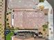 Aerial view of a home showing the roof, neighboring homes, and landscaped backyard at 1165 Cactus Rock St, Henderson, NV 89011