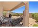 Spacious backyard features a brick-paved patio, seating area, and manicured bushes for outdoor enjoyment at 1165 Cactus Rock St, Henderson, NV 89011