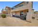 Backyard with covered patio, perfect for outdoor dining and relaxation at 1165 Cactus Rock St, Henderson, NV 89011