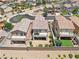 Home with a covered patio, yard with trampoline, and barbecue area at 1165 Cactus Rock St, Henderson, NV 89011