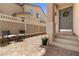Inviting front porch area with a brick ground covering and neutral paint colors at 1165 Cactus Rock St, Henderson, NV 89011