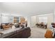 Bright and airy living room with comfortable seating, open to the kitchen and dining area, perfect for entertaining at 1165 Cactus Rock St, Henderson, NV 89011