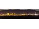 A vibrant night skyline of Las Vegas with mountain views at 1165 Cactus Rock St, Henderson, NV 89011