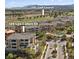 A view of 120 Los Cabos Dr near the TPC Golf Course, pool, landscaping, and the surrounding neighborhood at 120 Los Cabos Dr # 301, Las Vegas, NV 89144