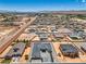 Expansive aerial view of the new home construction and desert landscape with mountains in the background at 1525 Heights Dr, Logandale, NV 89021
