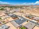 This aerial shot presents a modern home in a developing desert neighborhood with scenic views at 1525 Heights Dr, Logandale, NV 89021
