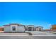 Beautiful, modern single-story home with desert landscaping and a stylish entrance at 1525 Heights Dr, Logandale, NV 89021