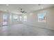 Bright living area with large windows offering panoramic views and a glass panel door at 1525 Heights Dr, Logandale, NV 89021