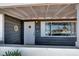 Close-up of a cozy front porch with house number, decorative accents, and covered entry at 21 Laswell St, Henderson, NV 89015