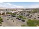 Commercial shopping center with ample parking and mountain views in the distance at 21 Laswell St, Henderson, NV 89015