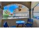 Cozy patio with seating area and views of the complex at 220 Mission Newport Ln # 105, Las Vegas, NV 89107