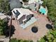 Backyard featuring a patio, two trampolines, desert landscaping, and partial view of the home's roof at 2500 Cortina Ave, Henderson, NV 89074
