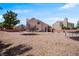 Large backyard showcasing ample space for activities, surrounded by privacy fencing at 2500 Cortina Ave, Henderson, NV 89074