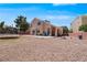 Expansive backyard featuring a patio area, providing ample space for outdoor activities at 2500 Cortina Ave, Henderson, NV 89074