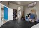Spacious bedroom featuring dual entry closet, dark floors, and light-filled windows at 2500 Cortina Ave, Henderson, NV 89074