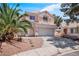 Charming two-story home featuring a well-maintained front yard and a two-car garage at 2500 Cortina Ave, Henderson, NV 89074