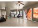 Spacious living room showing tile floors, backyard access and connectivity to the kitchen, ideal for entertaining at 2500 Cortina Ave, Henderson, NV 89074