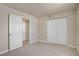 Bright bedroom features plush carpet, walk-in closet, and neutral paint at 2801 N Rainbow Blvd # 273, Las Vegas, NV 89108
