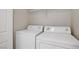 Convenient laundry area with a side-by-side washer and dryer, maximizing space efficiency at 2801 N Rainbow Blvd # 273, Las Vegas, NV 89108