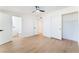 Bedroom featuring light wood floors, closet and access to bathroom at 2878 El Cajon St, Las Vegas, NV 89169