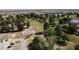 Aerial view of community near golf course, showcasing lush greenery and desert landscape at 3031 Pebble Beach Ave, Pahrump, NV 89048