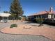 Well-kept backyard with landscaping, mature trees, and ample space at 3031 Pebble Beach Ave, Pahrump, NV 89048