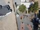Aerial view of backyard with gravel landscaping, trees, and detached structure at 3031 Pebble Beach Ave, Pahrump, NV 89048