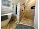 Beautiful bathroom featuring a soaking tub and walk-in shower with modern tile and updated fixtures at 3031 Pebble Beach Ave, Pahrump, NV 89048