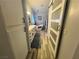 Bright bathroom with double vanity, soaking tub, and modern barn door at 3031 Pebble Beach Ave, Pahrump, NV 89048