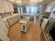 Spacious kitchen with stainless steel appliances, ample counter space, and stylish tile backsplash at 3031 Pebble Beach Ave, Pahrump, NV 89048