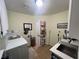 The spacious laundry room includes a stainless steel sink, modern appliances, and convenient storage at 3031 Pebble Beach Ave, Pahrump, NV 89048