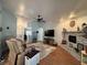 Spacious living room features hardwood flooring, a fireplace, and great lighting at 3031 Pebble Beach Ave, Pahrump, NV 89048