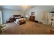 The spacious primary bedroom features carpet floors and lots of natural light at 3031 Pebble Beach Ave, Pahrump, NV 89048