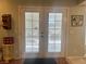 Bright patio door offering natural light with a view of the backyard at 3031 Pebble Beach Ave, Pahrump, NV 89048