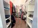 Spacious walk-in closet features built-in shelving and ample storage for clothes, shoes, and accessories at 3031 Pebble Beach Ave, Pahrump, NV 89048
