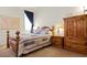 Cozy bedroom with carpeted floor, neutral decor, and ample natural light, offering a comfortable and serene atmosphere at 3088 Evening Mist Ave, Henderson, NV 89052