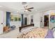 Bright bedroom with a view of the pool, comfortable bed, and a view of the backyard at 3108 Sonia Dr, Las Vegas, NV 89107