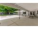 Large covered patio area offering ample space for seating and outdoor dining near the lush yard at 3108 Sonia Dr, Las Vegas, NV 89107