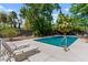 Inviting pool area featuring lounge chairs, mature trees, and a serene, private setting, ideal for relaxation at 3108 Sonia Dr, Las Vegas, NV 89107
