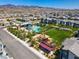 An aerial view showcasing the community pool and playground for outdoor Gathering fun at 3219 Timorasso Ave, Henderson, NV 89044