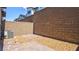 Low-maintenance backyard with stone pavers, offering a tranquil and private outdoor space at 3219 Timorasso Ave, Henderson, NV 89044
