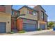 Modern townhouse featuring a two-car garage and contemporary design at 3219 Timorasso Ave, Henderson, NV 89044
